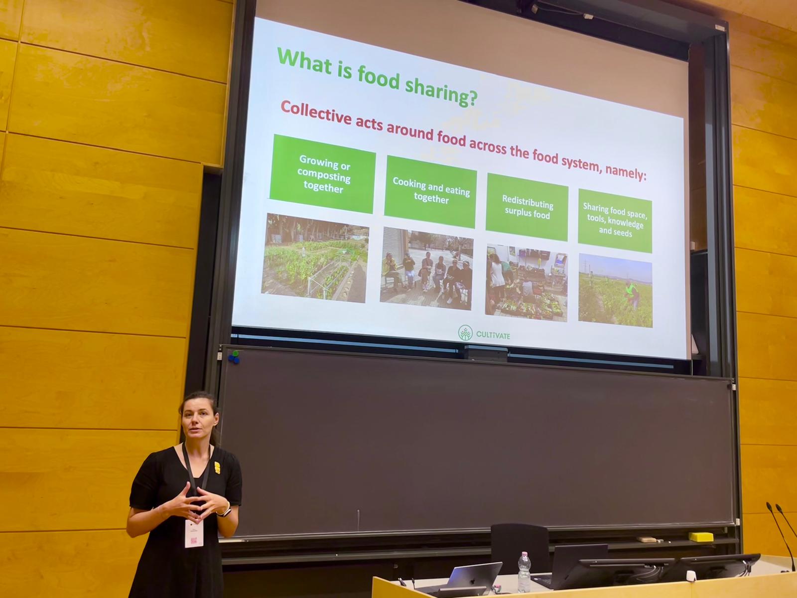 Woman giving a presentation at the International Society for Ecological Economics conference.